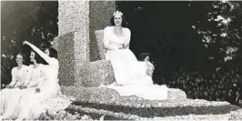  ?? PASADENA TOURNAMENT OF ROSES VIA AP ?? Margaret Huntley Main rides the parade float as the Pasadena Tournament of Roses queen in 1940.