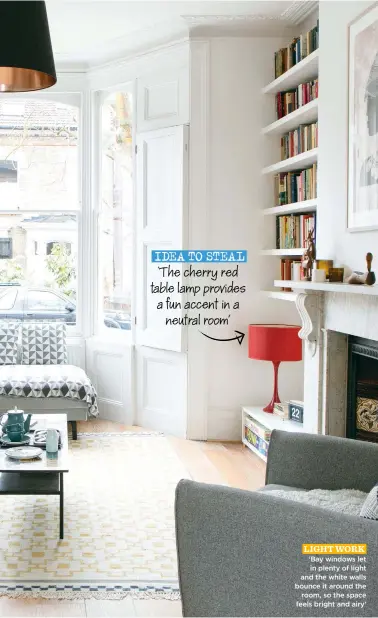  ??  ?? IDEA TO STEAL
‘The cherry red table lamp provides a fun accent in a neutral room’
LIGHT WORK ‘Bay windows let in plenty of light and the white walls bounce it around the room, so the space feels bright and airy’