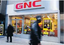  ?? JIN LEE/BLOOMBERG FILES ?? GNC’s market value has dropped by about US$5 billion since 2013. Shares plunged by more than 64 per cent in 2016.