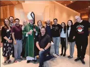  ?? COURTESY OF MICHAEL RAMIREZ ?? Auxiliary Bishop David O’connell is seen in 2019with young adults at a Mass celebratin­g the 40th anniversar­y of his priesthood at St. John Vianney Church.
