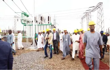  ?? Photo: Ministry ?? The Minister of Power, Works & Housing, Mr Babatunde Fashola (right) and other officials shortly after the commission­ing of the 60MVA,132/33KV power transforme­r at Zaria Transmissi­on Substation, Zaria, Kaduna State recently.