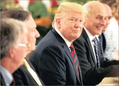  ?? PICTURE: EVAN VUCC/AP ?? President Donald Trump listens during a meeting with Singapore Prime Minister Lee Hsien Loong ahead of a summit with North Korean leader Kim Jong-un in Singapore.