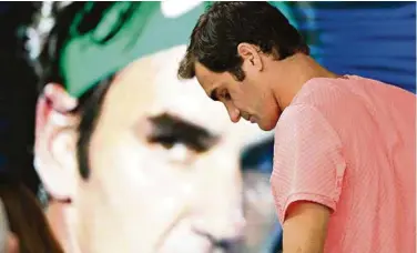  ??  ?? Roger Federer en conférence de presse à Melbourne, après sa victoire contre le Sud-Coréen Chung Hyeon en demi-finale. (DEAN LEWINS/EPA/KEYSTONE)