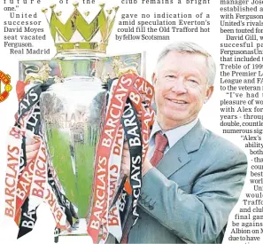  ??  ?? RIGHT TIME: Sir Alex Ferguson celebrates with the English Premier League trophy after their match against Blackpool at Old Trafford in Manchester, north west England in this May 22, 2011 file photo. — AFP photo
