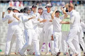  ?? CREDIT / HT PHOTO ?? England cricketers celebrate after beating Bangladesh on the final day in Chittagong.