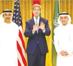  ??  ?? ABU DHABI: US Secretary of State John Kerry (center) gestures alongside Emirati Foreign Minister Sheikh Abdullah bin Zayed Al-Nahyan (left) and Saudi Foreign Minister Adel Al-Jubeir yesterday. — AFP
ABU DHABI: