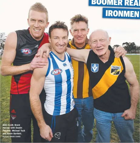  ?? Picture: DAVID CAIRD ?? 400 CLUB: Brent Harvey with Dustin Fletcher, Michael Tuck and Kevin Bartlett.