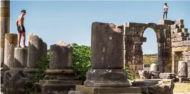  ??  ?? Situated in the centre of a fertile plain at the foot of Mount Zerhoun, the towering remains of Morocco’s oldest Roman site, Volubilis, were long neglected. Now the closely guarded ancient city of Volubilis is turning the page and attracting tourists again.