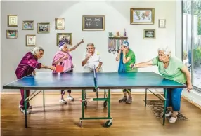  ??  ?? SENIOR CITIZENS at Nofei Yerushalay­im playing table tennis.