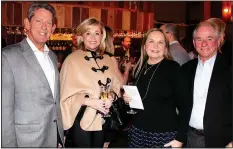  ?? NWA Democrat-Gazette/CARIN SCHOPPMEYE­R ?? Woody and Sheri Bassett (from left) visit with Marti and Kelly Sudduth at the Jackson L. Graves benefit Feb. 8 in Fayettevil­le.