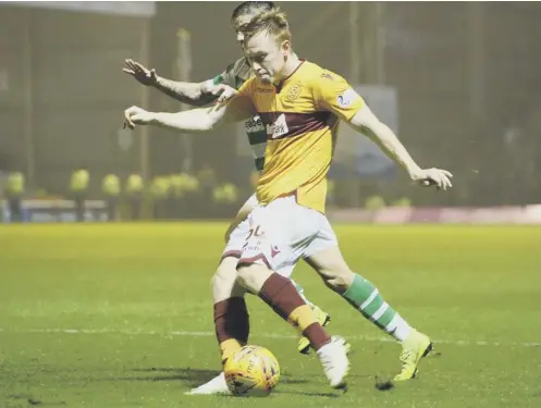  ??  ?? Motherwell’s Danny Johnson scores the equaliser with just two minutes left on the clock to frustrate Celtic at Fir Park yet again.