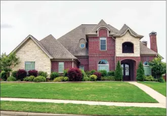  ?? LINDA GARNER-BUNCH/Arkansas Democrat-Gazette ?? This home, located at 5523 Atlantic Cove in Benton, has about 3,445 square feet and is listed for $359,900 with Mark Chilton of Baxley-Penfield-Moudy Realtors. Today’s open house is from 1 to 4 p.m. For more informatio­n, call Chilton at 501-317-2299.