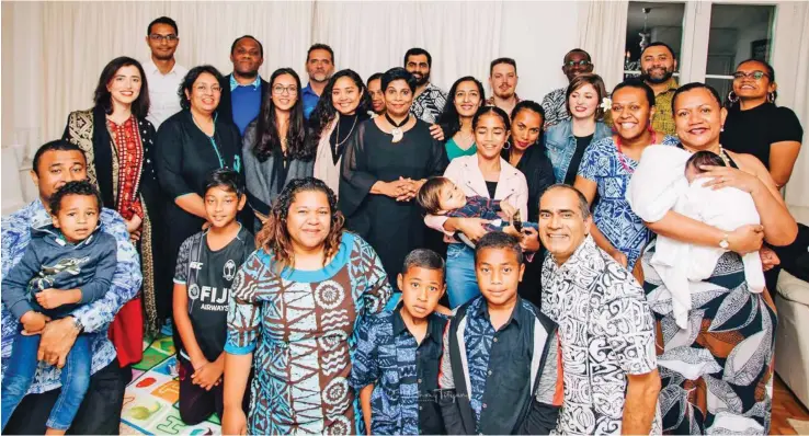  ?? Photo: Fiji’s Permanent Mission to the United Nations in Geneva. ?? Fiji’s Permanent Representa­tive to the United Nations in Geneva Ambassador Nazhat Shameem Khan with staff members and their families during a dinner event at Fiji House earlier this week.
