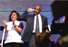  ?? CHIEKO HARA ?? RECORDER PHOTO BY Mayor Milt Stowe and his wife, Lorry, sing with the Port Naz congregati­on Sunday, June 17, at the Portervill­e Church of the Nazarene. Stowe was the guest speaker during a special Father’s Day service.