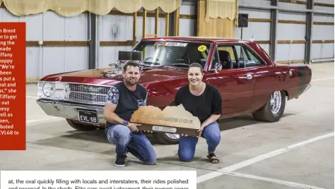  ??  ?? Grand Champion Brent Murray was keen to get some help holding the trophy – it was made of stone! Wife Tiffany was more than happy to lend a hand. “We’re just stoked, it’s been amazing. Brent’s put a lot of blood, sweat and tears into this car,” she said. Brent and Tiffany wanted to shout out their mates Parkesy and Benny, as well as sons Cale and Coen, who have contribute­d so much to get EVL68 to the podium