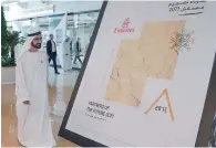  ?? Wam ?? Sheikh Mohammed during his visit to Area 2071, where 11 vital sectors signed 12 agreements to design UAE’s future. —