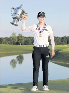  ?? AFP ?? Park Sung-Hyun with the US Women’s Open trophy at Trump National Golf Club.