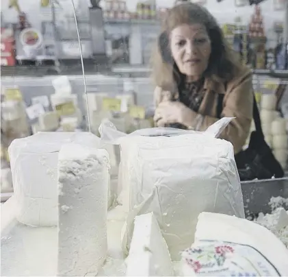  ??  ?? 0 Feta cheese, as seen on sale in Athens, must be made in Greece from ewes’ and goats’ milk under EU rules