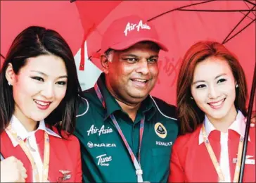  ?? AFP ?? AirAsia founders Datuk Kamarudin Meranun and Tan Sri Anthony (centre) have relinquish­ed their executive posts as the budget carrier forms a committee to review the allegation­s against them.