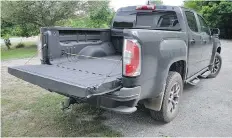  ??  ?? 2016 GMC Canyon SLE 4WD rear view.