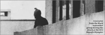  ?? PHOTO: GETTY IMAGES ?? A terrorist from the Black September group during the attack at the 1972 Munich Olympics