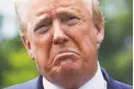  ?? Mandel Ngan / AFP via Getty Images ?? President Donald Trump speaks to the press as he departs the White House on May 21.