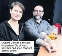  ??  ?? Owners Duncan Sime and his partner Ola at Kwas, wine bar and shop, Viaduct Street, below