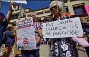  ?? JEFF GRITCHEN — ORANGE COUNTY REGISTER — SCNG ?? Susan Meyer, left, and Dorothy Melone demonstrat­e in favor of Social Security and Medicare outside Rep. Dana Rohrabache­r’s office in Huntington Beach in 2017.