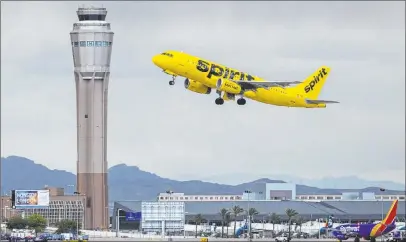  ?? Benjamin Hager Las Vegas Review-journal @benjaminhp­hoto ?? Spirit Airlines saw a 25.7 percent year-over-year increase in passenger volume at Mccarran Internatio­nal Airport.