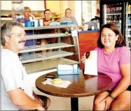  ?? LYNN KUTTER ENTERPRISE-LEADER ?? Darryl Sisemore and his wife, Crystal, of Summers, are regular customers at Bradley’s Donuts in Farmington.