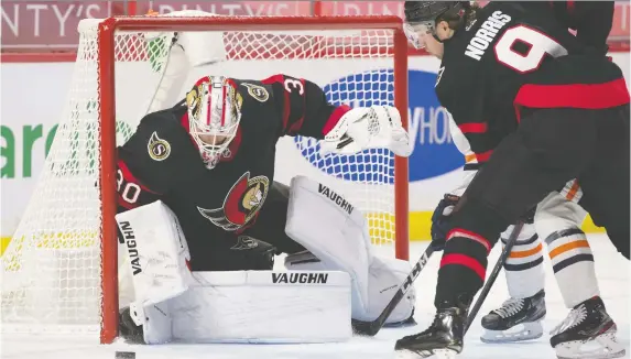  ?? MARC DESROSIERS/USA TODAY SPORTS ?? Senators goalie Matt Murray makes a pad save after losing his stick in the first period against the Oilers at the Canadian Tire Centre on Monday.