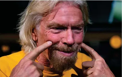  ??  ?? Letting himself and his staff down: billionair­e Branson could learn from Abramovich and Neville who have been generous in a time of crisis