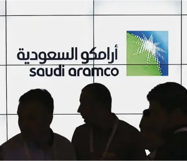  ?? — Bloomberg ?? Listing plan: The Aramco logo is seen at the World Petroleum Congress in Istanbul, Turkey. Saudi officials have said the kingdom plans to sell as much as 5% of Aramco next year in what could be the world’s biggest IPO.