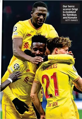  ?? GETTY IMAGES ?? Our hero: scorer Origi is mobbed by Tsimikas and Konate