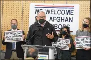  ?? TED S. WARREN/AP ?? Washington Gov. Jay Inslee speaks during a news conference at the Afghan Welcome Center at the Seattle-Tacoma Internatio­nal Airpor.