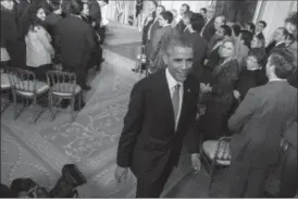  ??  ?? President Barack Obama walks off after a news conference in the East Room of the White House on Wednesday in Washington.