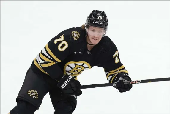  ?? MICHAEL DWYER — THE ASSOCIATED PRESS ?? Boston Bruins forward Jesper Boqvist skates against the Florida Panthers during the first period Saturday. He later potted the game-winning goal.