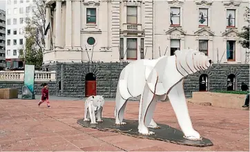  ??  ?? A cub from the Winter Wonderland display in Aotea Square has gone for a walkabout.