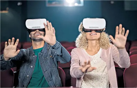  ??  ?? Show of hands: watching theatre on virtual reality headsets, above.
Hamlet, top, launched LIVR’S shows, while
One Man, Two Guvnors, below, was a cinema hit for Ntlive