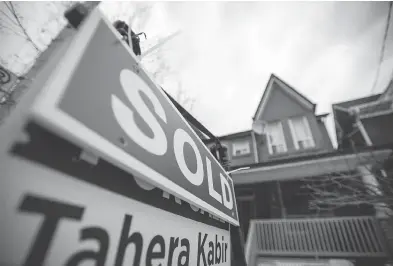  ?? TYLER ANDERSON / NATIONAL POST FILES ?? The worst may have passed for the Greater Toronto Area following Ontario policy changes to restrict foreign buyers, but analysts say the future is unclear. Sales in Ontario and B.C. are expected to fall by about 10 per cent this year.