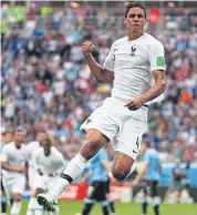  ?? EPA ?? France’s Raphael Varane celebrates after scoring against Uruguay.