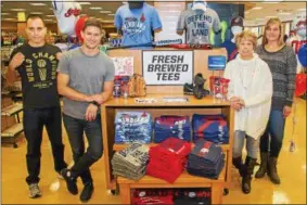  ?? SUBMITTED ?? Tony Madalone, second from left, stands with bookstore staff members Ray Carbonell, left, Patty Clark and Lisa Hearn.