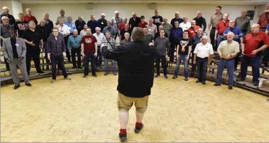  ?? JOHN RENNISON, THE HAMILTON SPECTATOR ?? The Harbourtow­n Sound Chorus rehearses under the direction of musical director Jordan Travis. Members travel from far and wide to Flamboroug­h’s Millgrove Community Centre to practice.