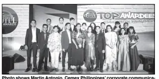  ??  ?? Photo shows Martin Antonio, Cemex Philippine­s’ corporate communicat­ions analyst (7th from left), presenting the award to Bataan Peninsula State University.