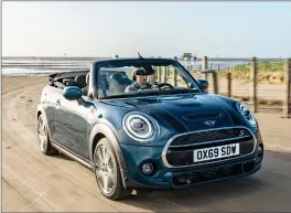  ??  ?? Mini is already looking ahead to summer with the launch of a Sidewalk Edition for its popular Convertibl­e model