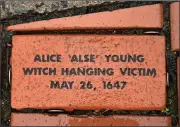  ?? (AP/Jessica Hill) ?? A brick memorializ­ing Alice “Alse” Young is seen Jan. 24 in a town Heritage Bricks installati­on in Windsor. Young was the first person on record to be executed in the 13 colonies for witchcraft.