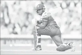  ?? Media) (Photo courtesy CWI ?? Jason Mohammed goes on the attack during his innings during Wednesday’s fourth ODI at the Oval.