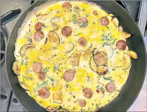  ?? BIBBY GIGNILLIAT ?? A zucchini and Italian sausage frittata is delicious served for breakfast, brunch, lunch or dinner.