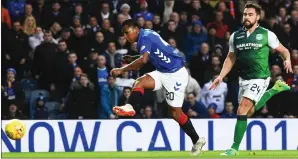  ??  ?? Alfredo Morelos opens the scoring for Rangers at Ibrox yesterday