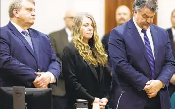  ?? KYLE GREEN AP ?? Lori Vallow Daybell stands and listens as the jury’s verdict is read in Boise, Idaho, on Friday. She faces up to life in prison at her sentencing, expected to be in at least three months.